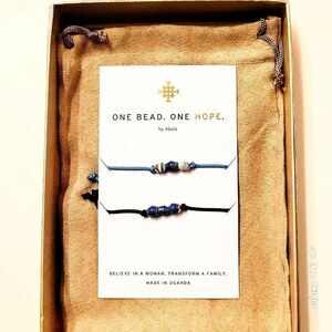 NIB Akola Set of 2 Royal Blue Bicone Beaded Adjustable Bracelets & Suede Bag